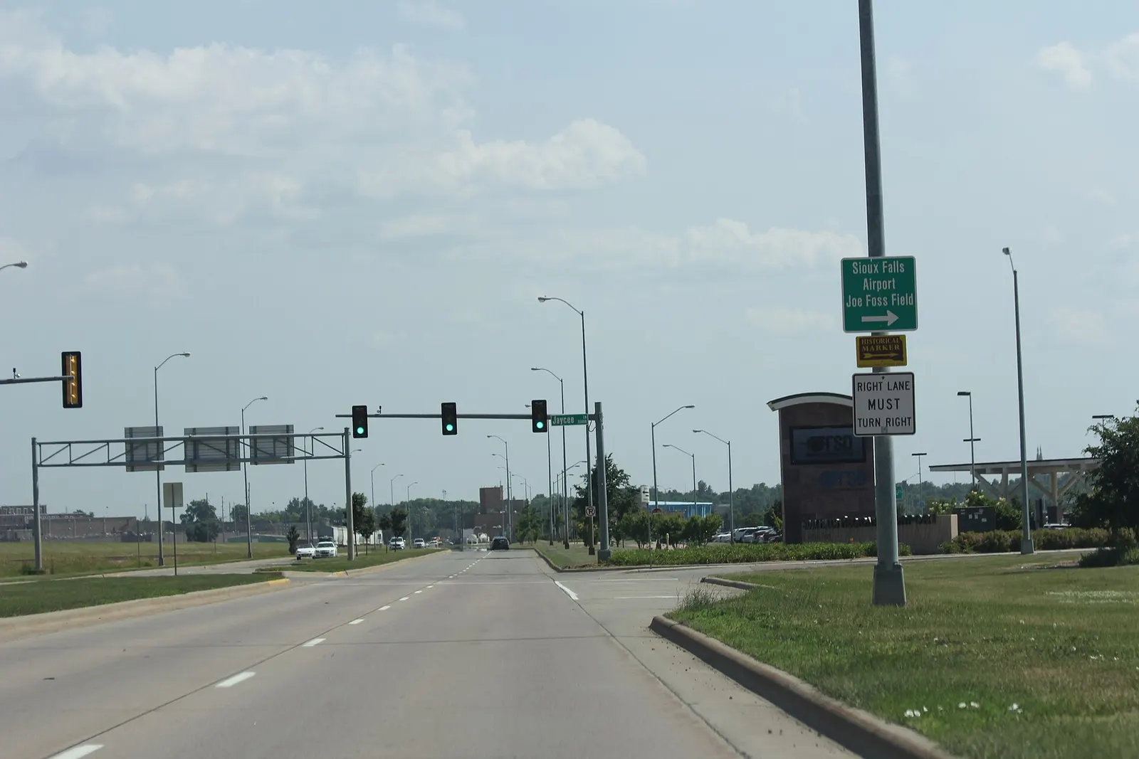 2016 curb and canopy at the Sioux Falls Regional Airport Costello Terminal entrance, looking toward the civil passenger building.