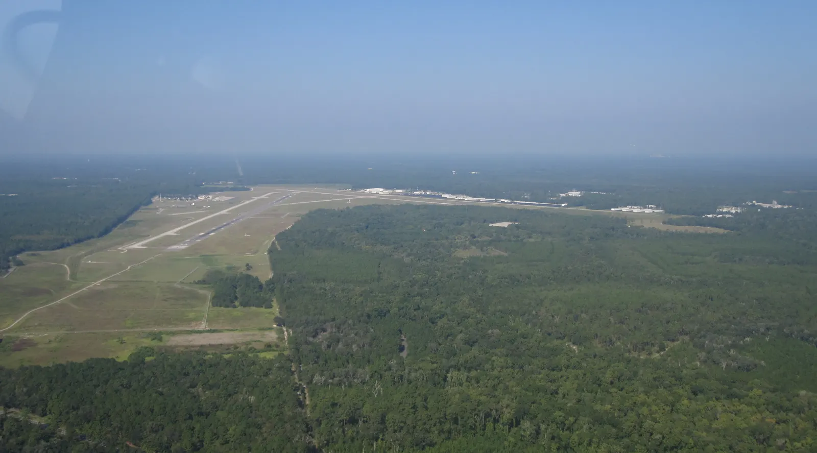 Looking west over Gainesville Regional Airport after a northbound departure from Runway 11, October 2010.
