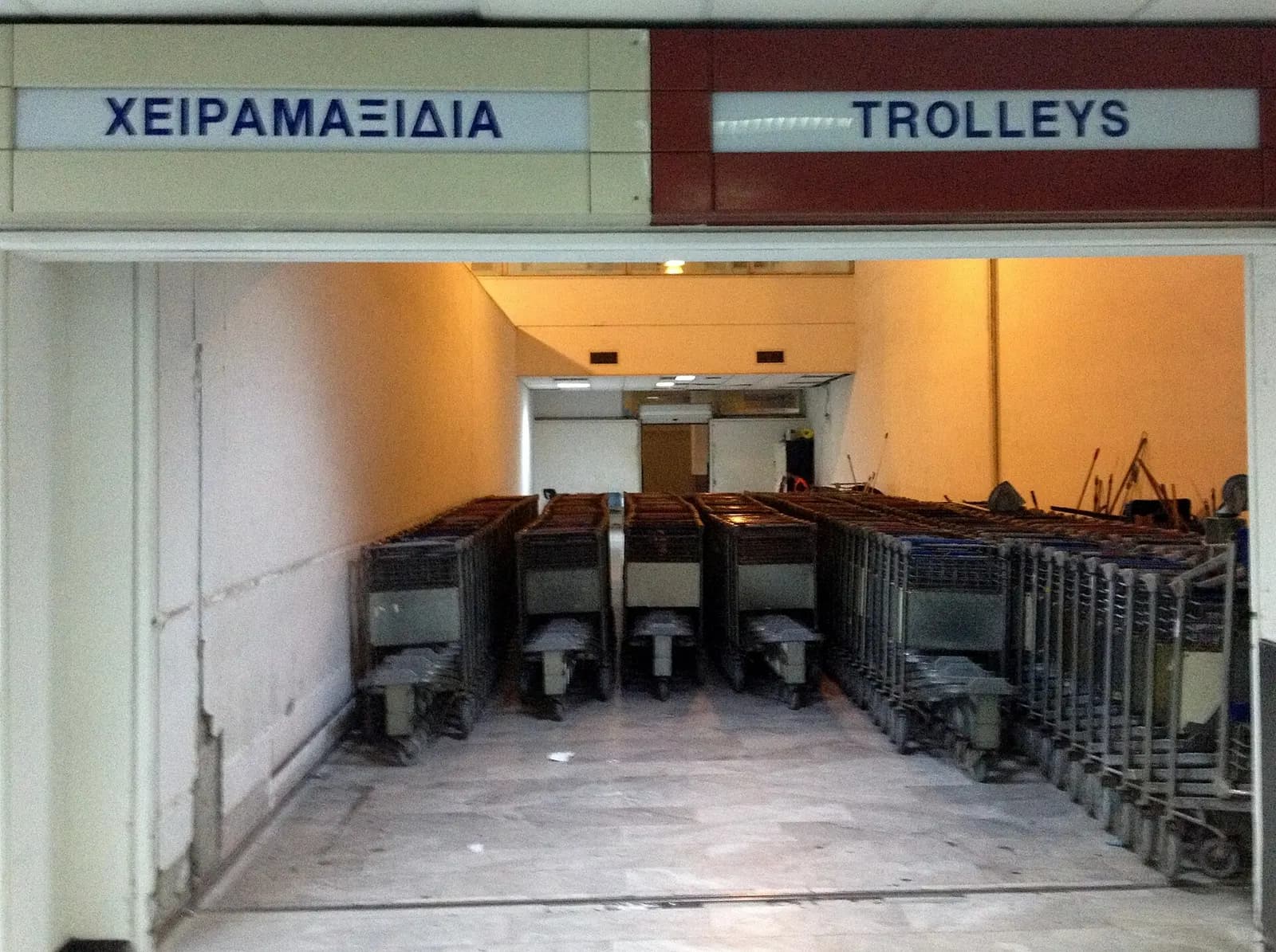 Luggage trolleys outside the Heraklion Airport terminal entrance