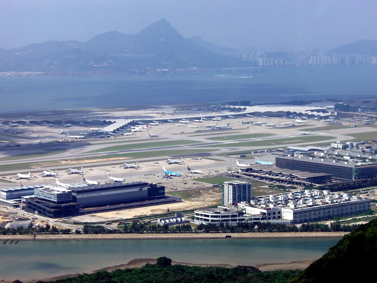 Hong Kong International Airport's terminal and runways seen from the Ngong Ping 360 cable car across Lantau Island.