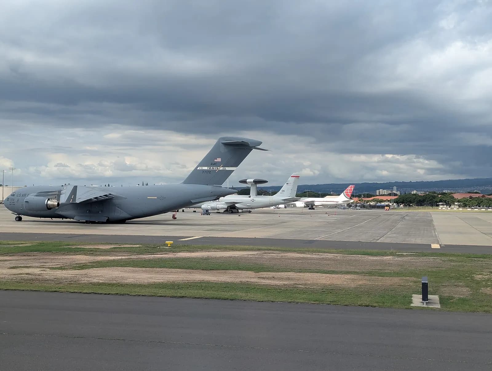 Military aircraft parked at Daniel K. Inouye International Airport