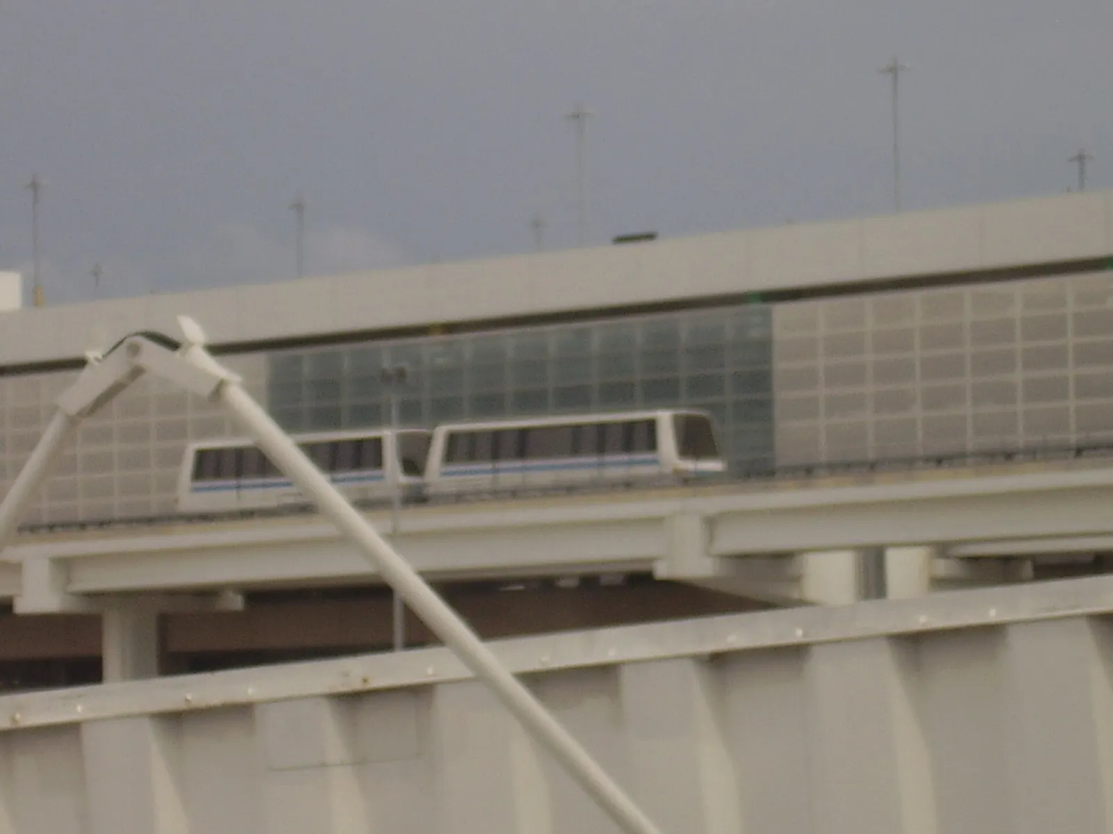 A TerminaLink tram car on its track outside the terminal buildings at George Bush Intercontinental Airport.