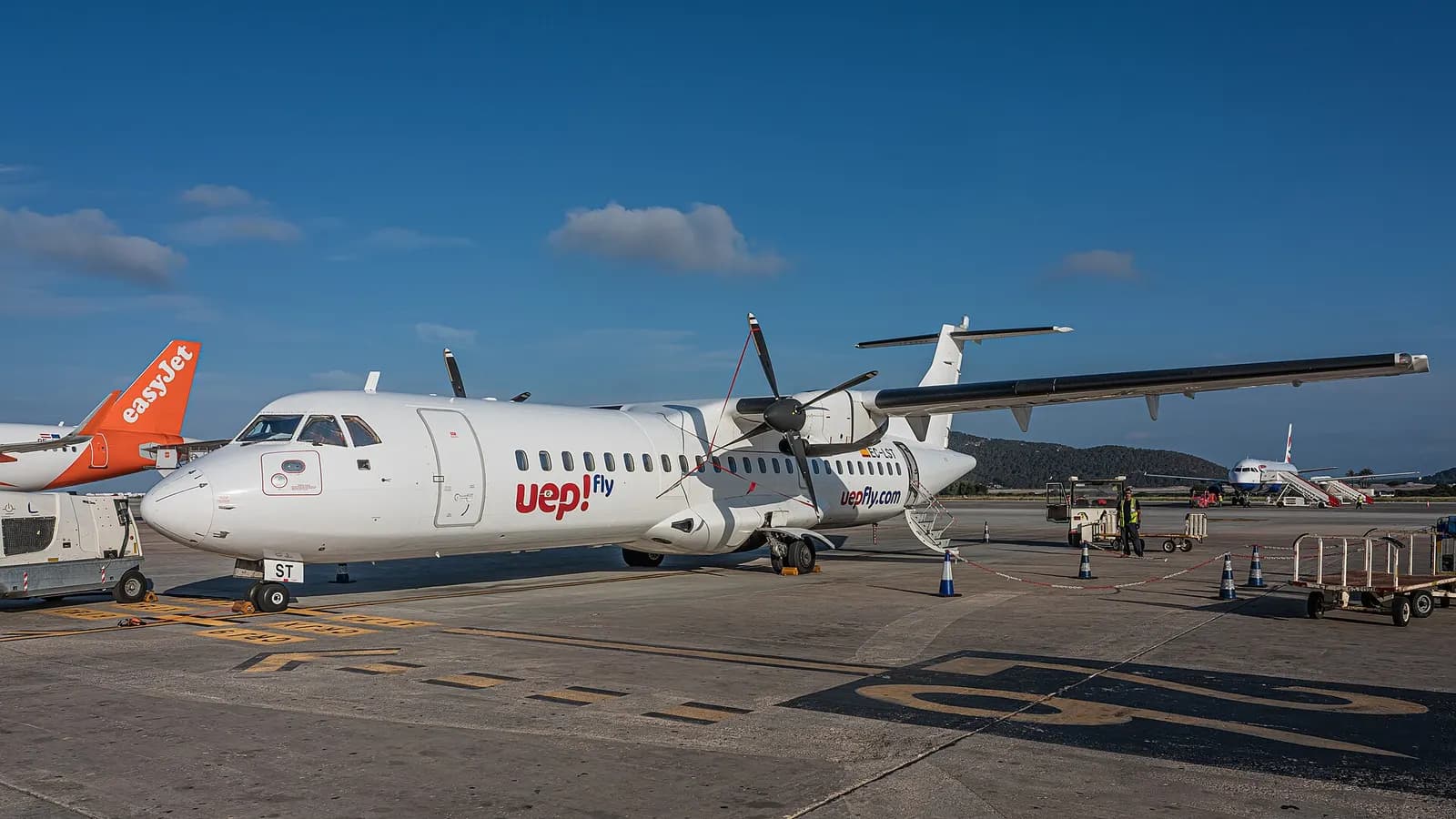 Ibiza Airport terminal and surrounding apron infrastructure.