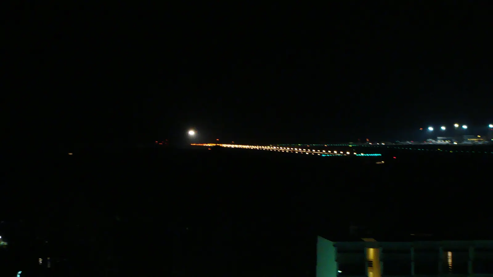 Ibiza Airport terminal illuminated at night in July 2011.