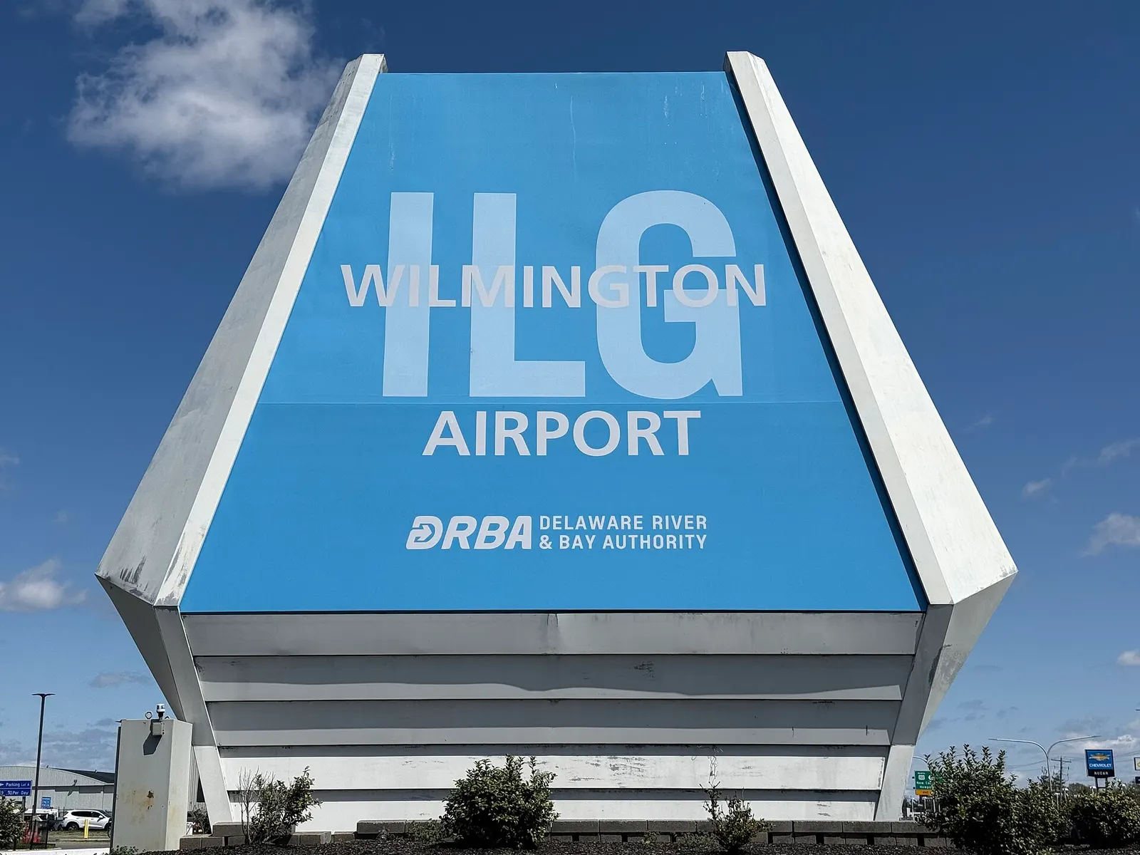 Roadside Wilmington Airport sign in Hares Corner, New Castle County, photographed 8 April 2025.