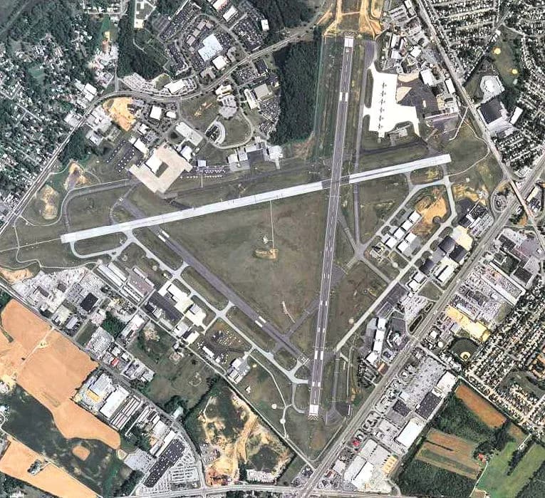 USGS digital orthophoto of New Castle Airport showing the runway triangle in Delaware.