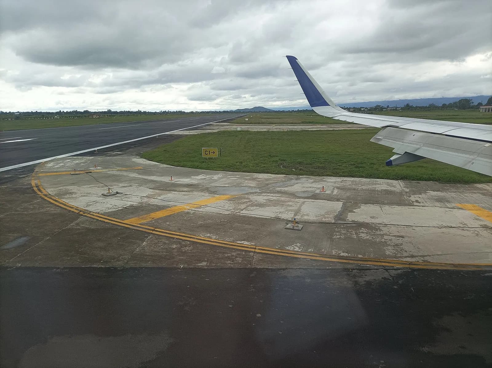 Runway (Aeroplane landing point or airplane take off spot) in the Imphal International Airport (also known as Tulihal International Airport or Bir Tikendrajit International Airport) in Imphal, the capital city of Kangleipak (better known as Manipur state) - It is known as Imphal Malang Hithangpham (