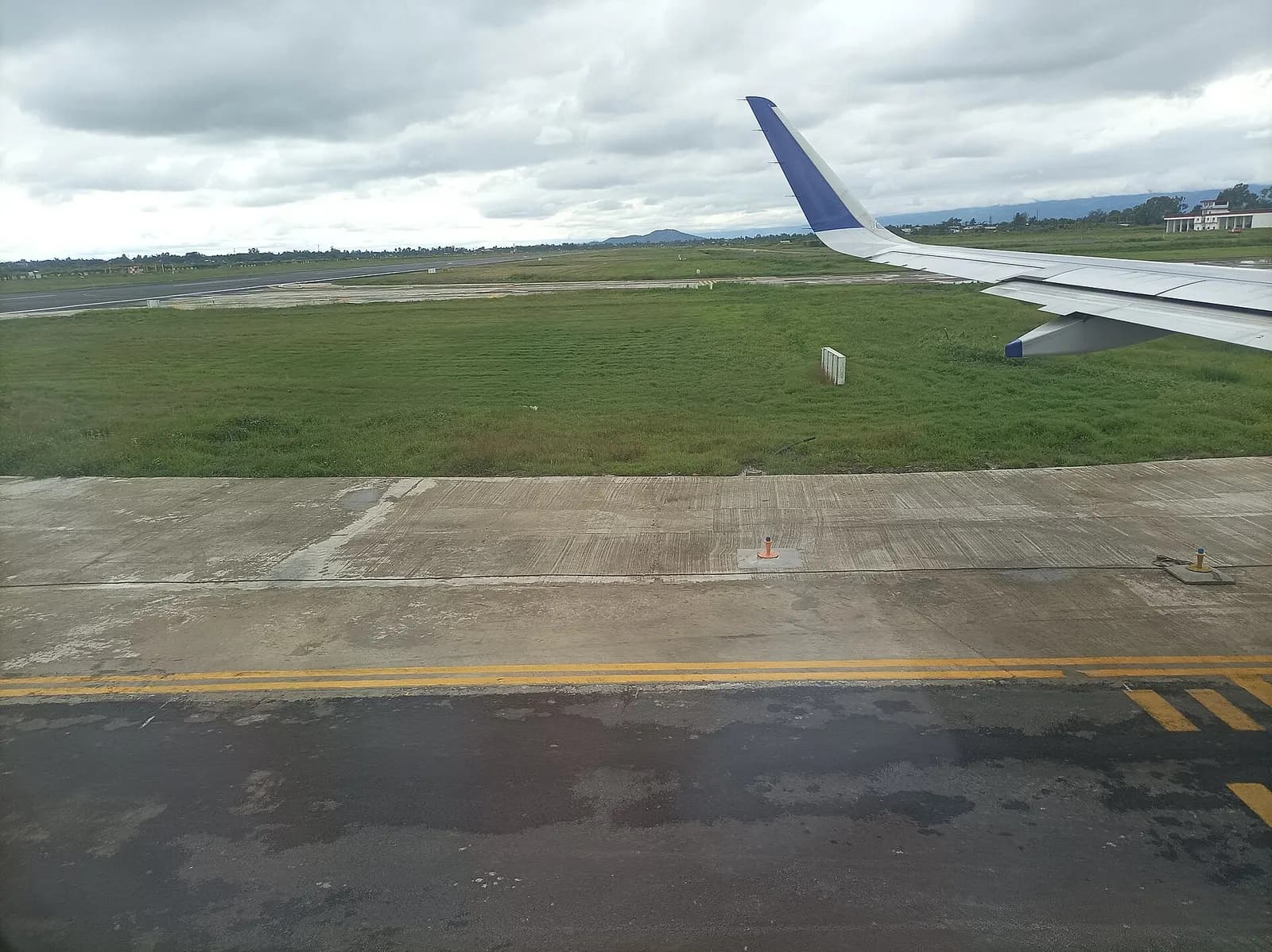 Runway (Aeroplane landing point or airplane take off spot) in the Imphal International Airport (also known as Tulihal International Airport or Bir Tikendrajit International Airport) in Imphal, the capital city of Kangleipak (better known as Manipur state) - It is known as Imphal Malang Hithangpham (
