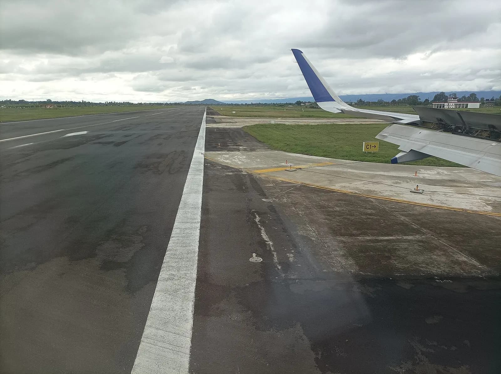 Runway (Aeroplane landing point or airplane take off spot) in the Imphal International Airport (also known as Tulihal International Airport or Bir Tikendrajit International Airport) in Imphal, the capital city of Kangleipak (better known as Manipur state) - It is known as Imphal Malang Hithangpham (