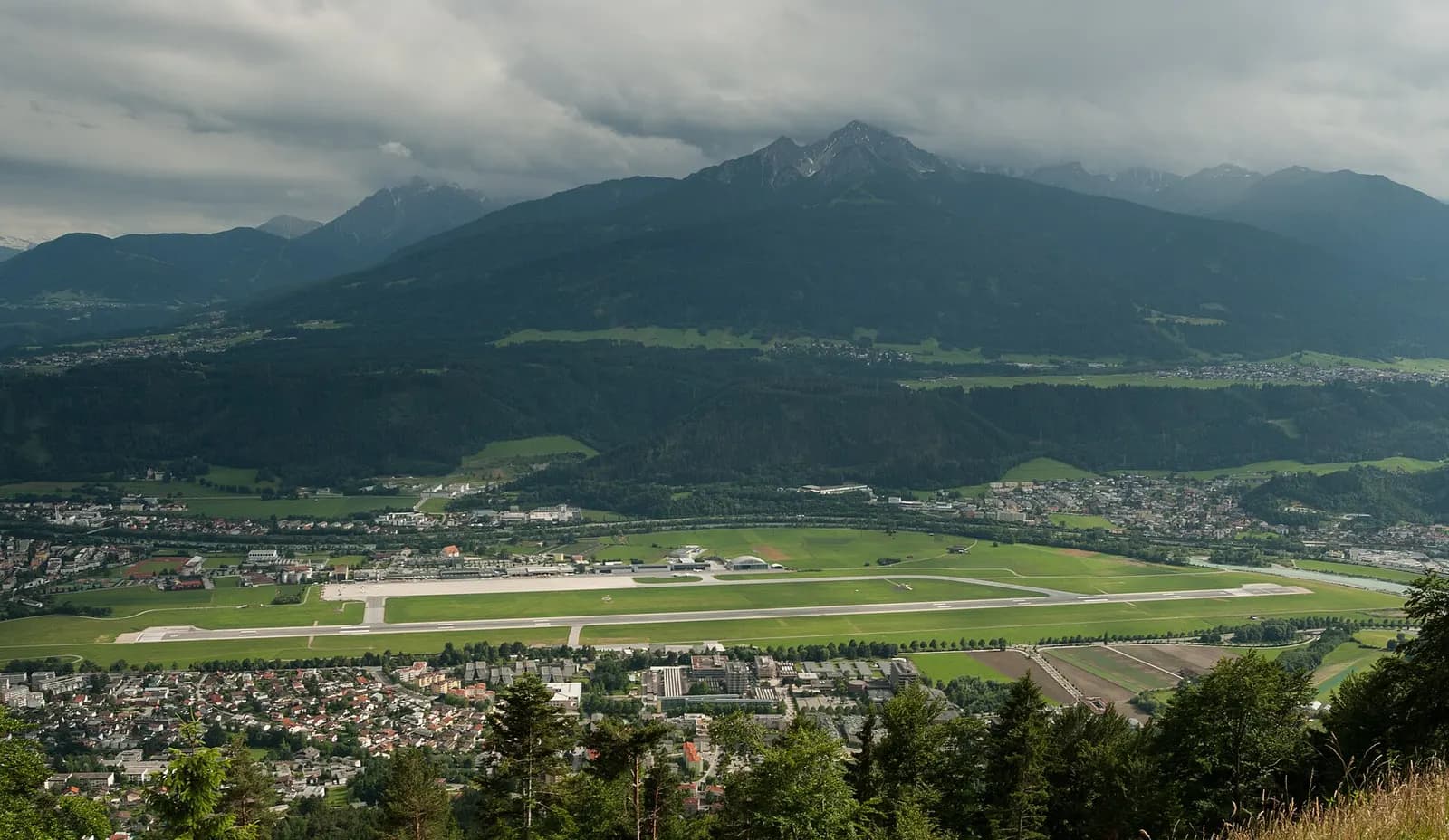 Innsbruck Airport airfield with Nockspitze mountain beyond