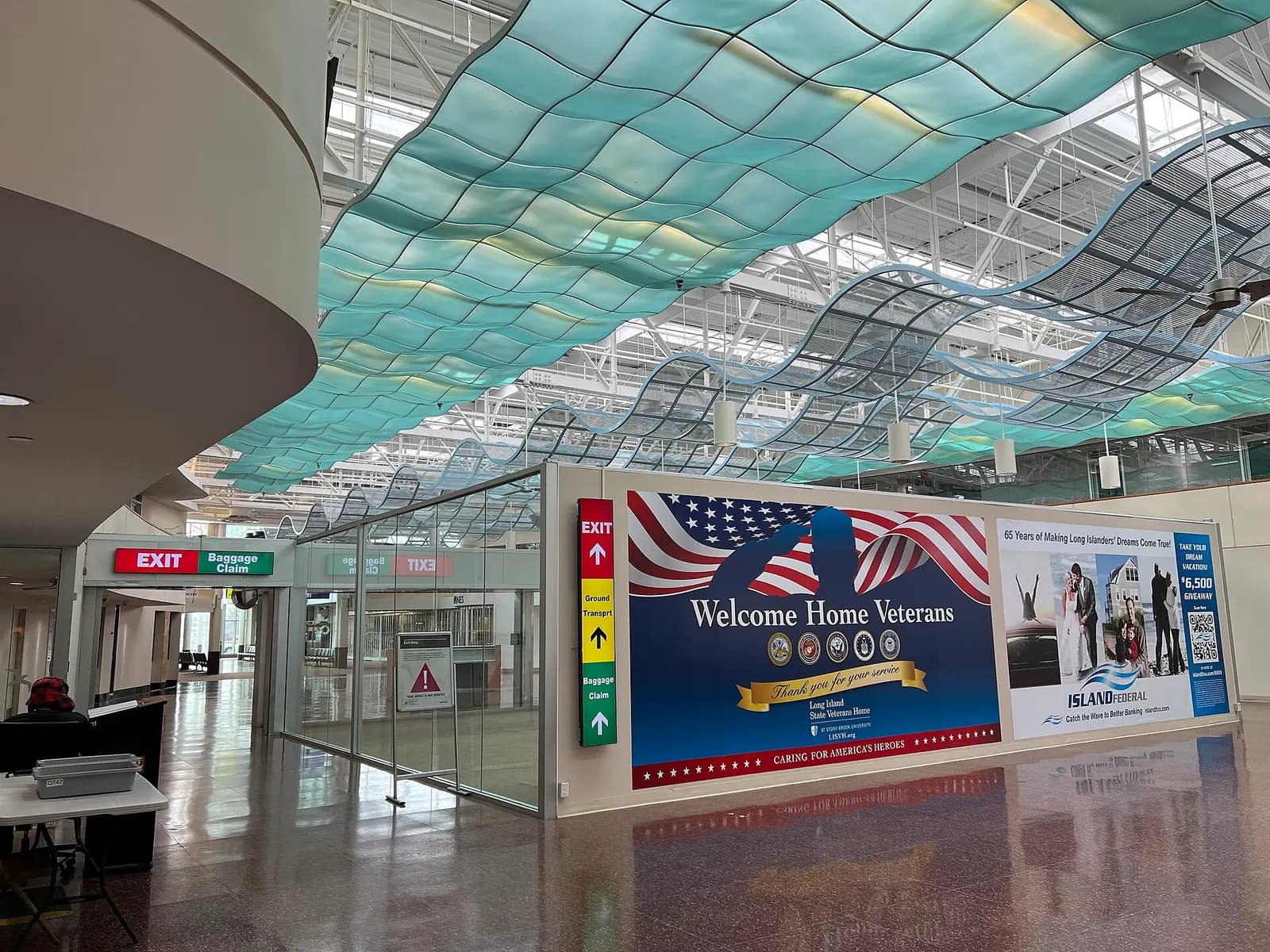 Western airside-to-landside exit and TSA checkpoint at Long Island MacArthur Airport on 20 February 2023.