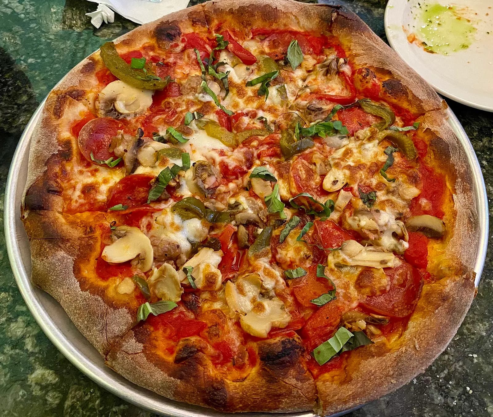 Pepperoni, sausage, mushrooms, roasted red peppers