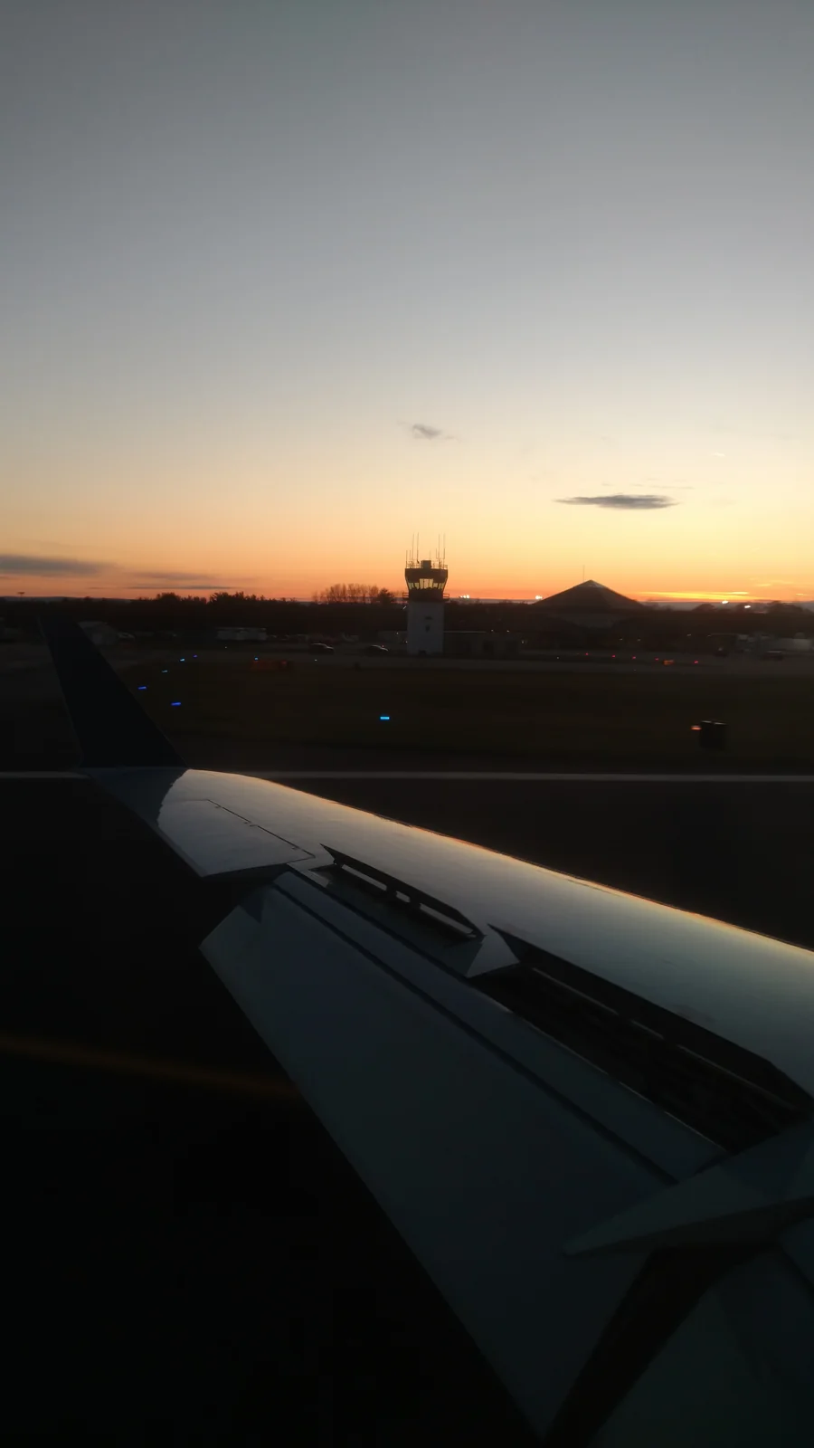 Ithaca Tompkins Airport control tower from aircraft wing