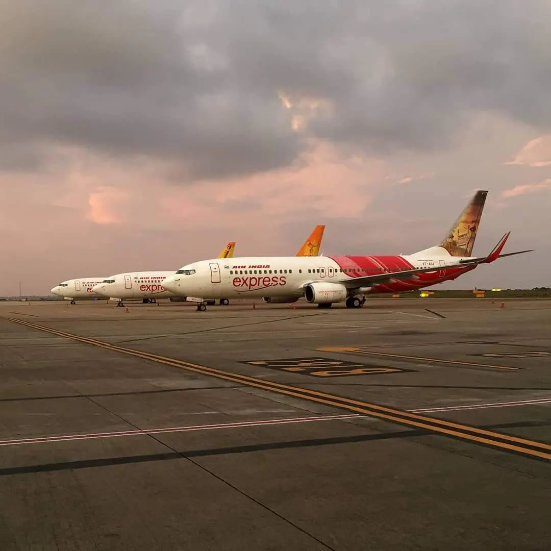 Air India Express Boeing 737s parked on the apron at Mangaluru International Airport