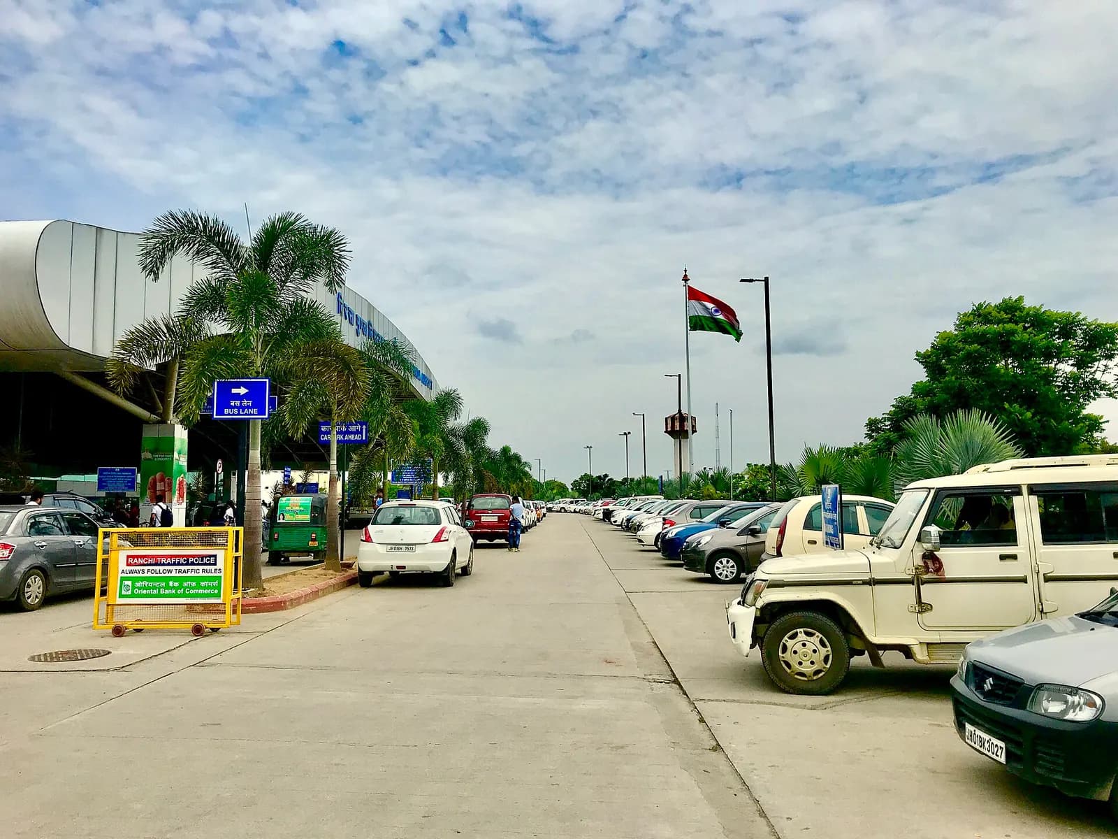 Approach road and Birsa Munda Airport, Ranchi signage with terminal canopy