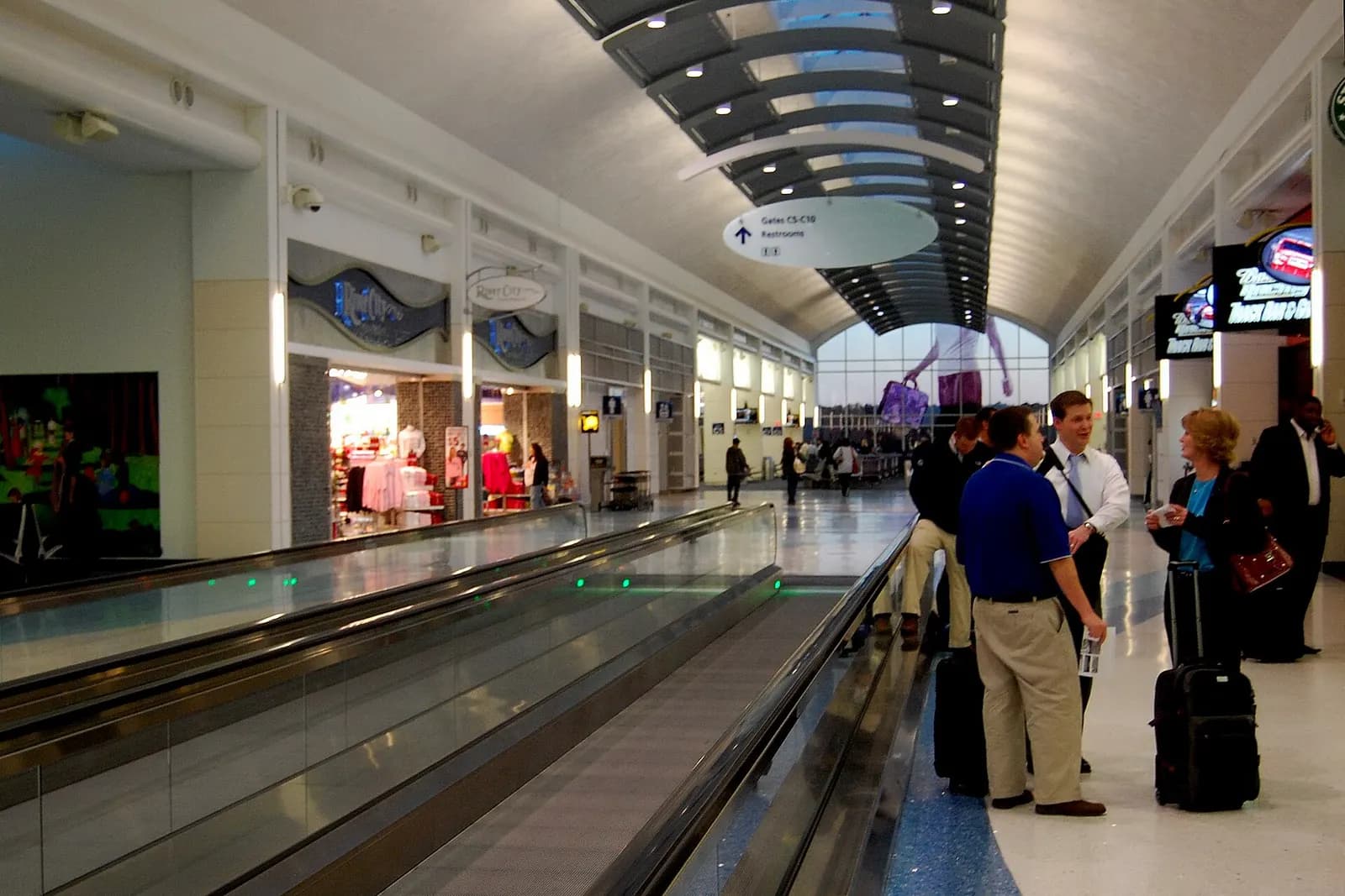 Jacksonville International Airport Concourse C toward gates C5–C10 past River City Travel Mart