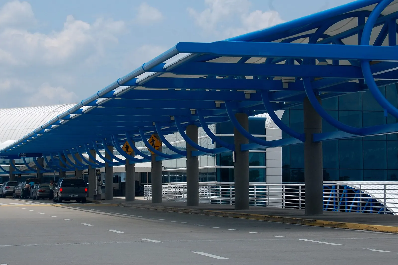 Jacksonville International Airport upper-level departures curb under the blue canopy