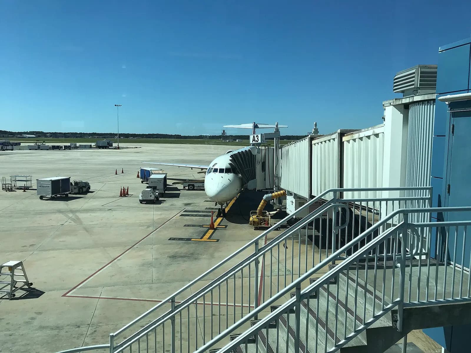 Delta aircraft on stand at Jacksonville International Airport Gate A3