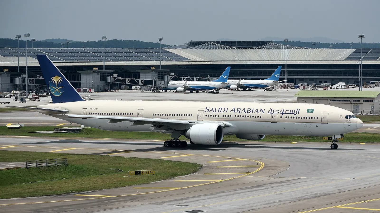 Saudia Boeing 777-368ER HZ-AK13 taxiing at Kuala Lumpur International Airport (KUL/WMKK), near Kuala Lumpur, Malaysia, on departure for King Abdulaziz International Airport (JED/OEJN), near Jeddah, Saudi Arabia, as SV829