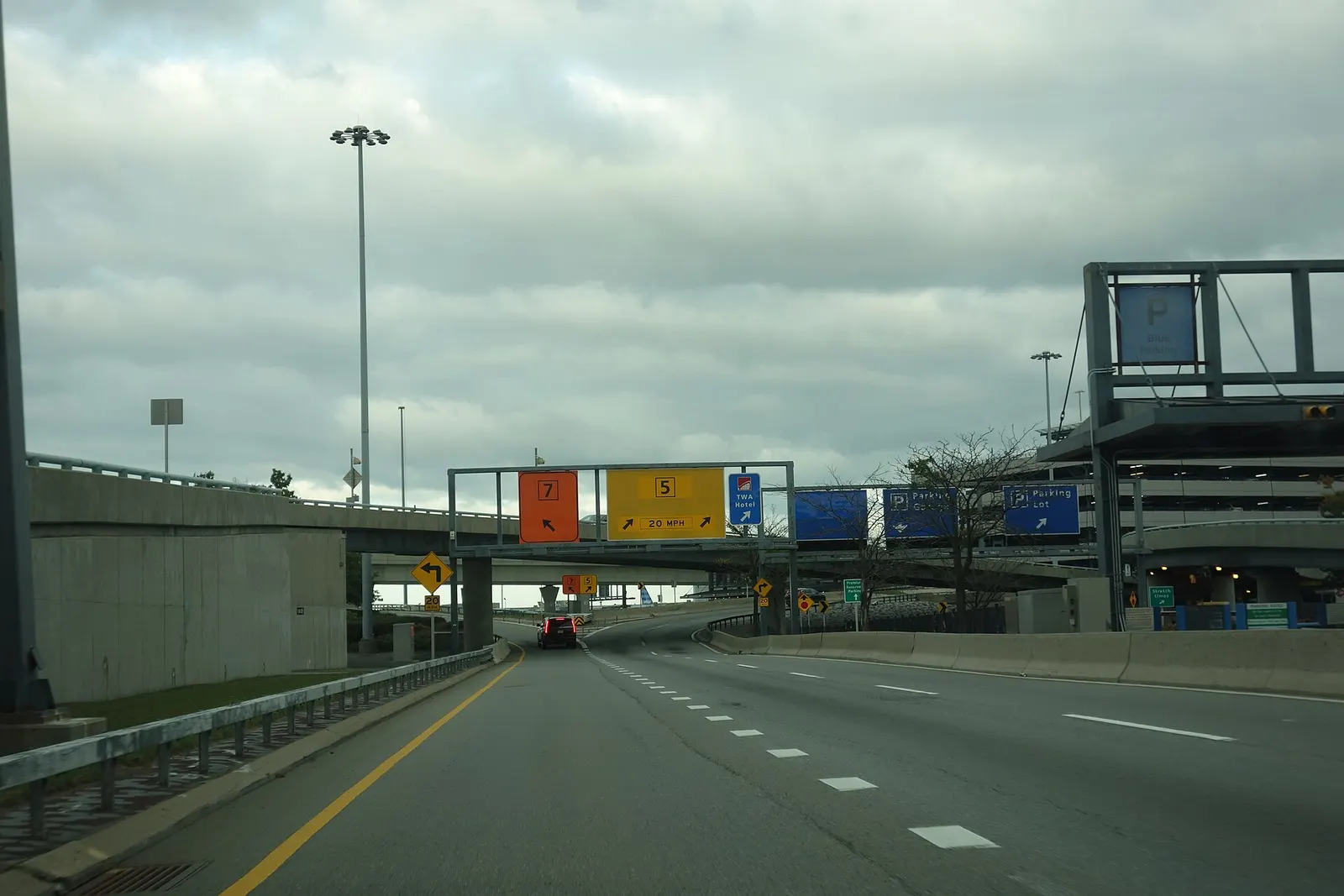 Traveling east on the final stretch of the Van Wyck Expressway through the central terminal area of John F. Kennedy International Airport, near South Ozone Park, Queens.
