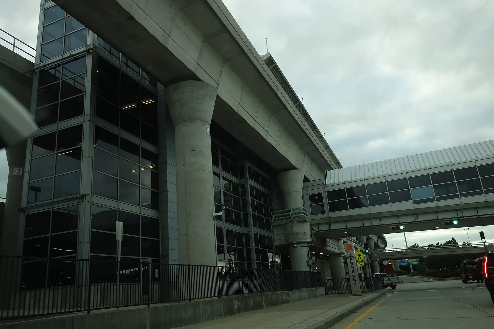 Looking at the AirTrain JFK station at Terminal 7 in the central terminal area of John F. Kennedy International Airport, near Springfield Gardens, Queens. This terminal is anchored by British Airways.