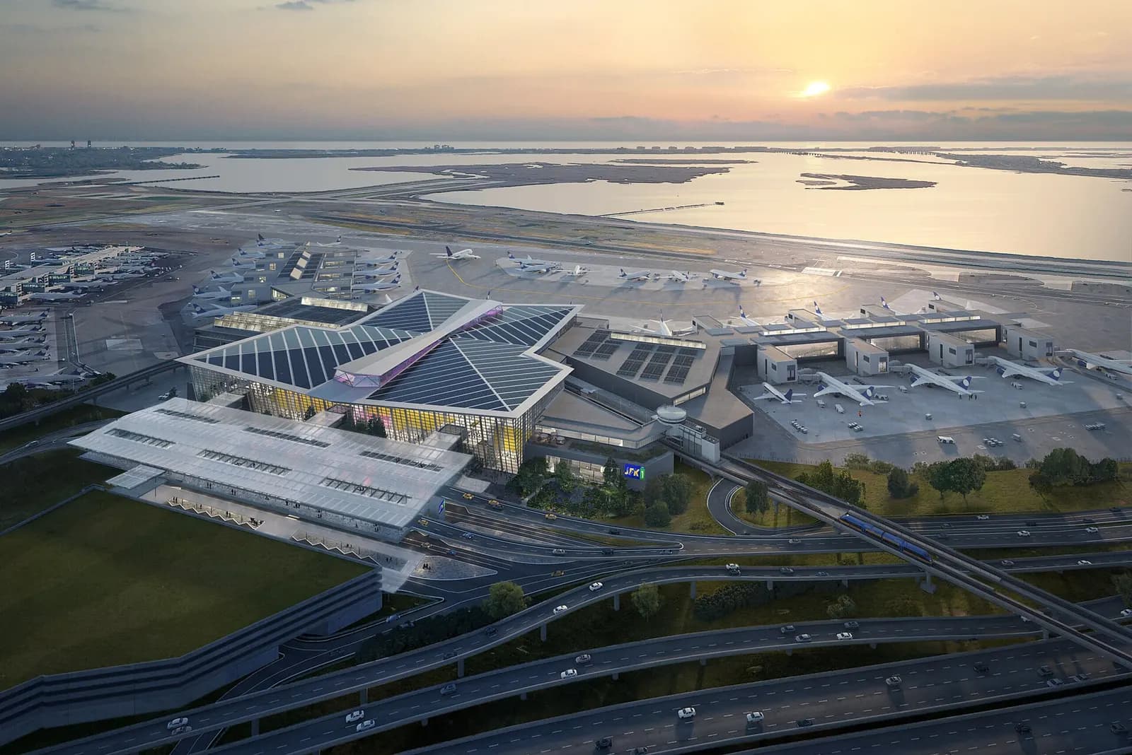 The exterior of the new Terminal One building shows a modern glass-and-steel facade along the airport roadway.