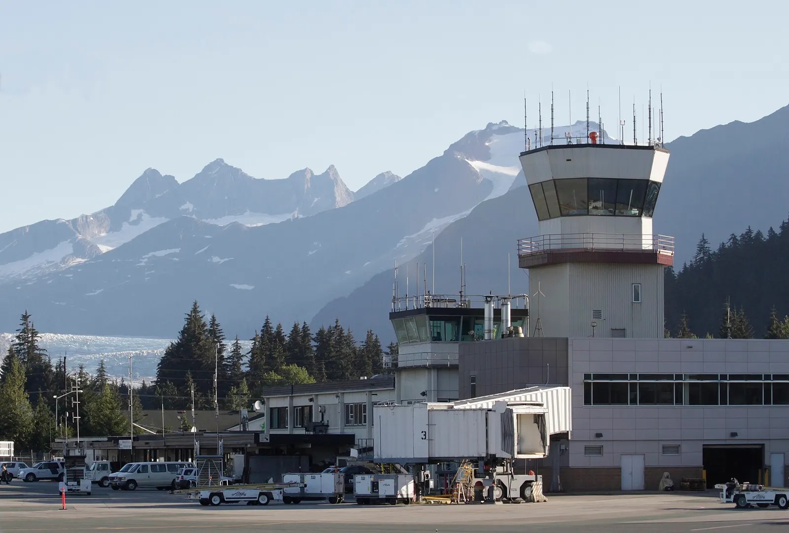 Juneau International Airport control tower with Mendenhall Glacier behind it, photographed 3 August 2014.
