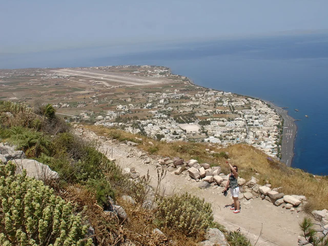 Santorini Airport and Kamari coastline from an elevated inland viewpoint