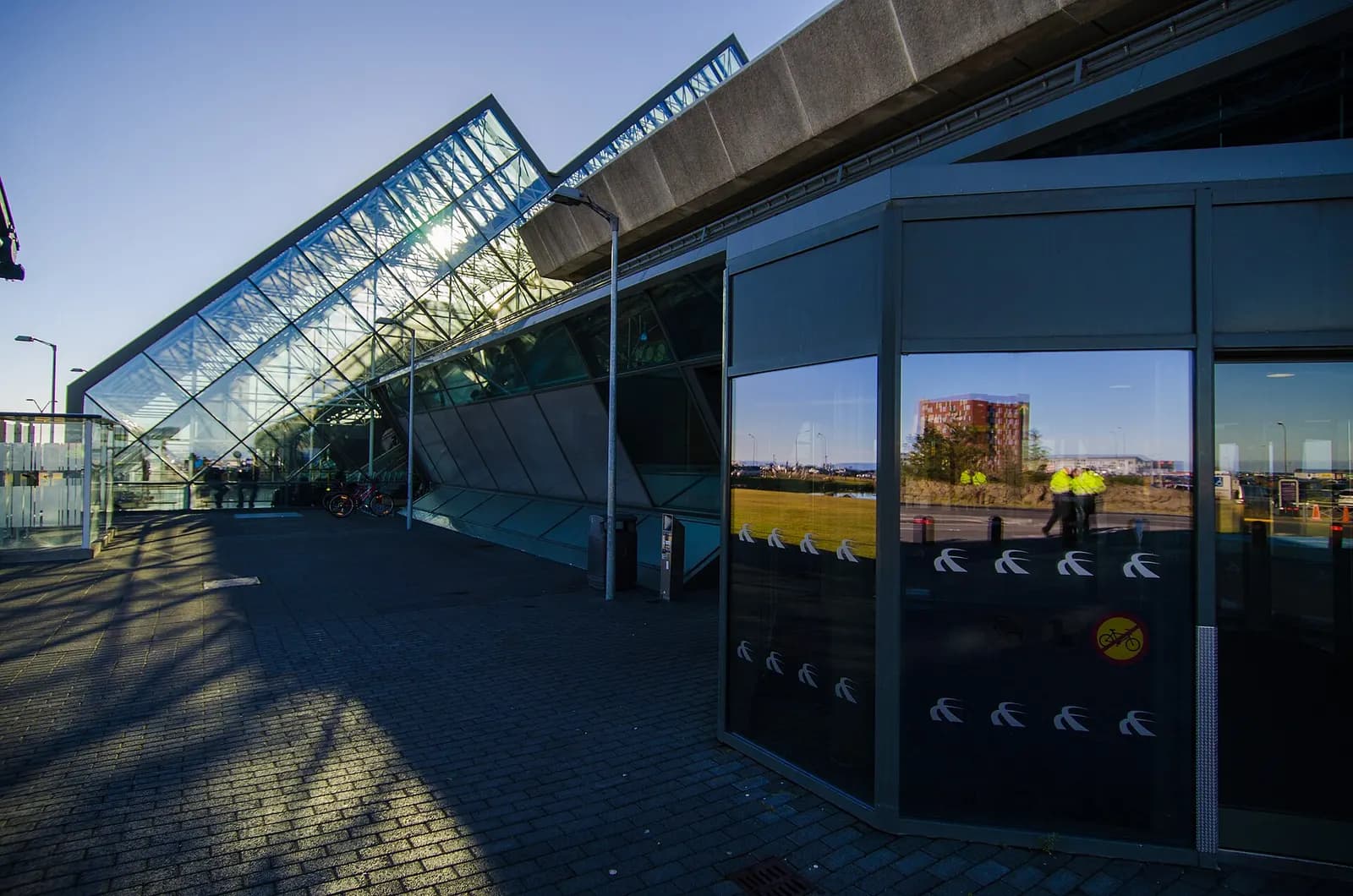 Terminal buildings at Keflavík International Airport under Icelandic sky