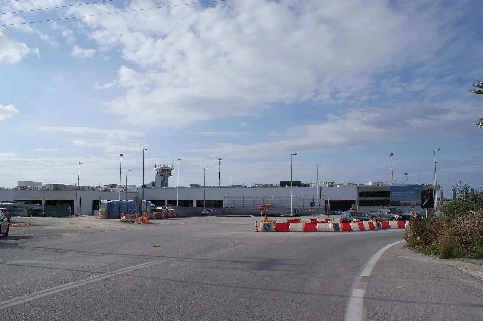 Kos Ippokratis Airport terminal building exterior and forecourt.