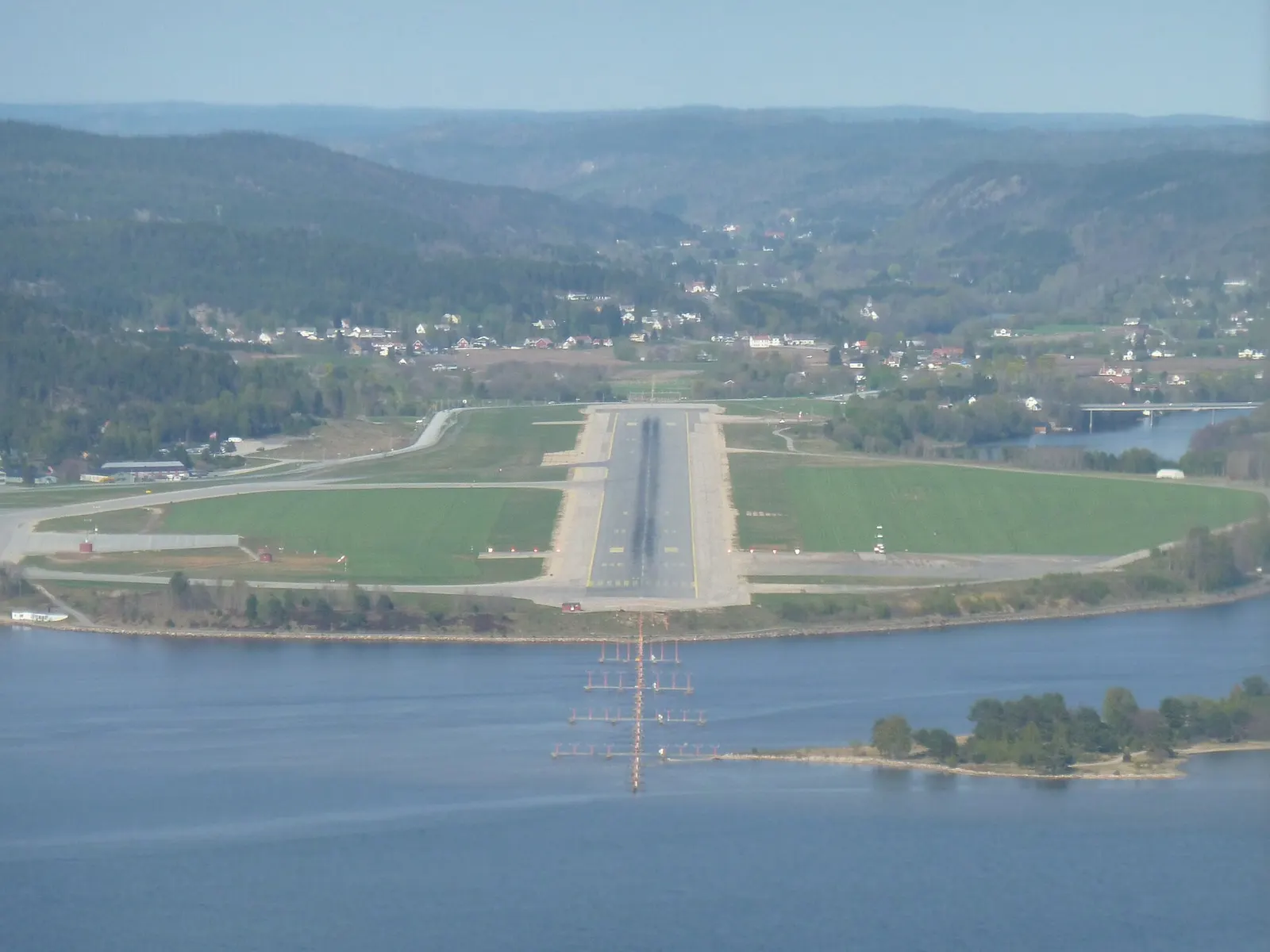 View on the runway of Kristiansand-Kjevik airport, approaching RWY 04