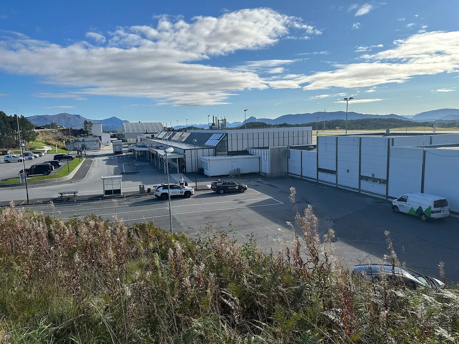 Landside buildings, taxi area and parking at Kristiansund Airport