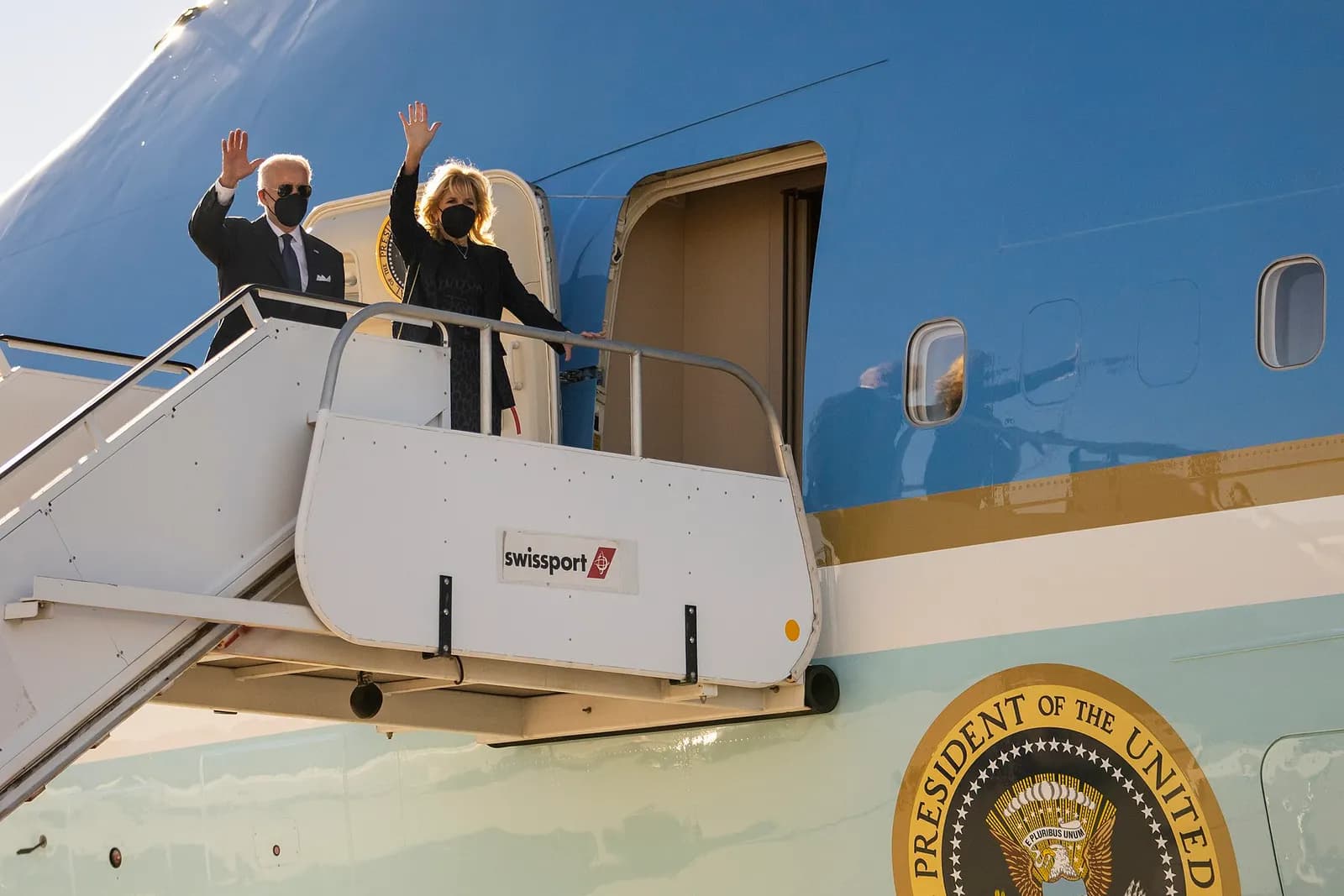 President Joe Biden and First Lady Jill Biden wave as they board Air Force One at Harry Reid International Airport in Las Vegas, Saturday, January 8, 2022, en route to Joint Base Andrews, Maryland. (Official White House Photo by Adam Schultz)