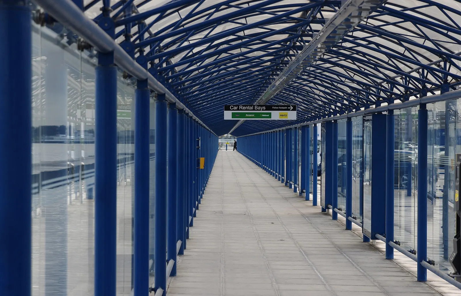 Covered walkway connecting London City Airport terminal areas
