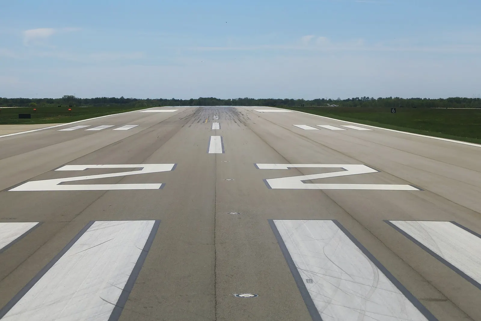 Blue Grass Airport runway 22/4 pavement markings photographed in May 2023.
