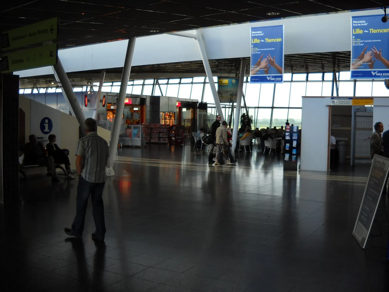 Lille-Lesquin Airport terminal interior toward departures