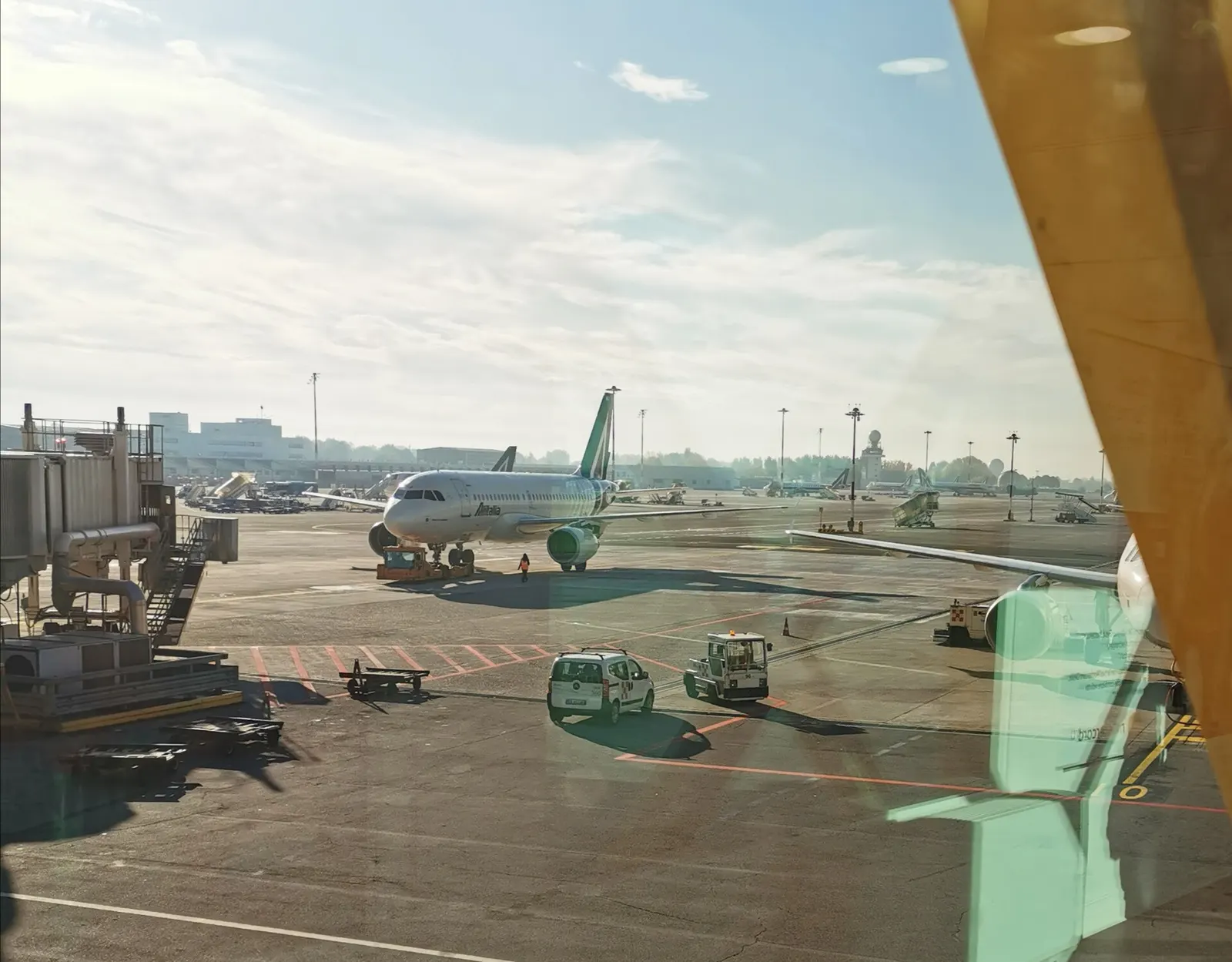 Many Alitalia aircraft at Milan Linate Airport.
