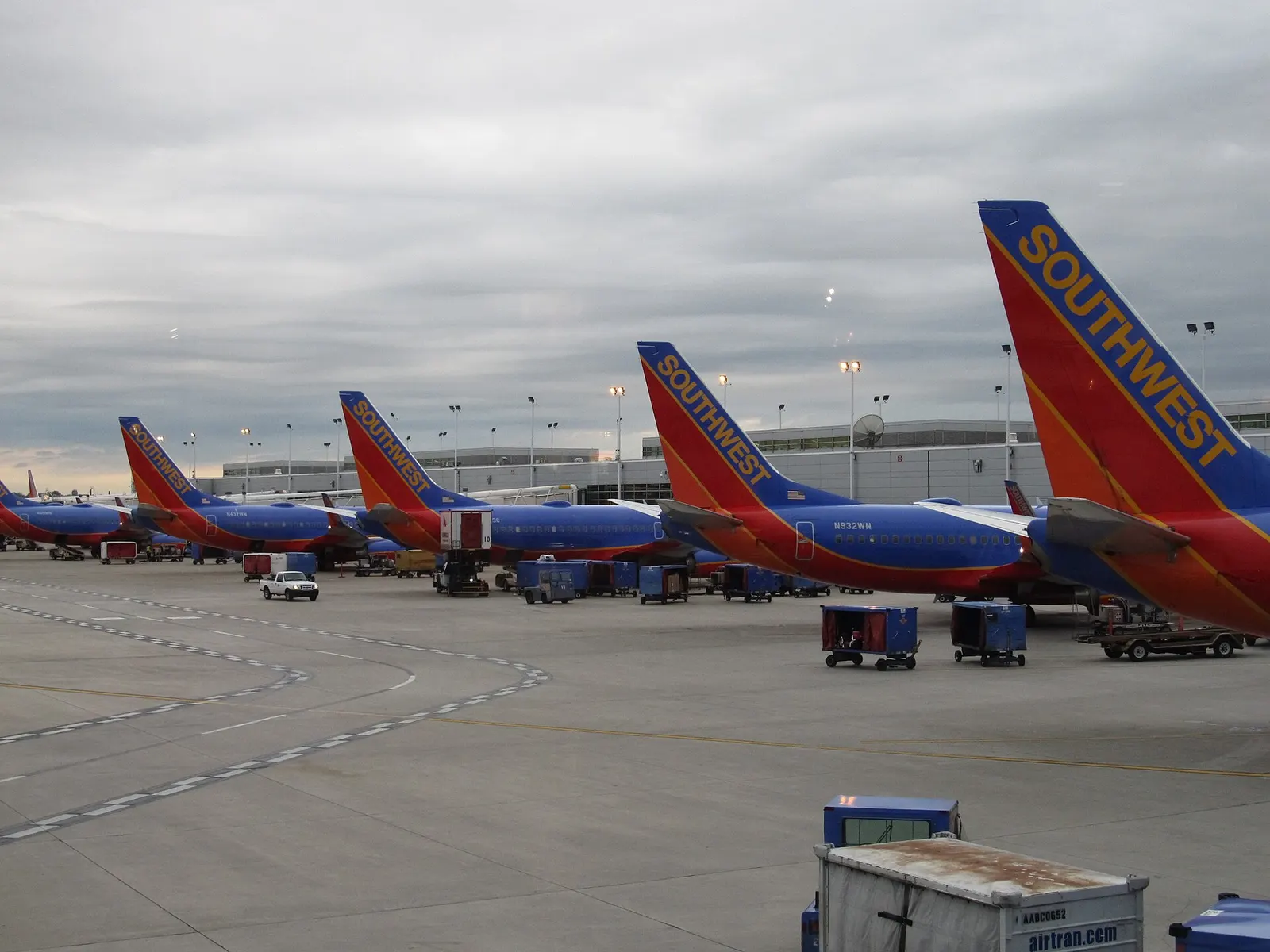 Southwest Airlines aircraft parked at Midway gates along the airside concourse