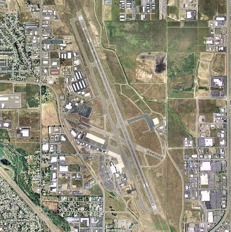 USGS 2006 orthophoto of Rogue Valley International–Medford Airport looking across the civil campus and runway 14/32.