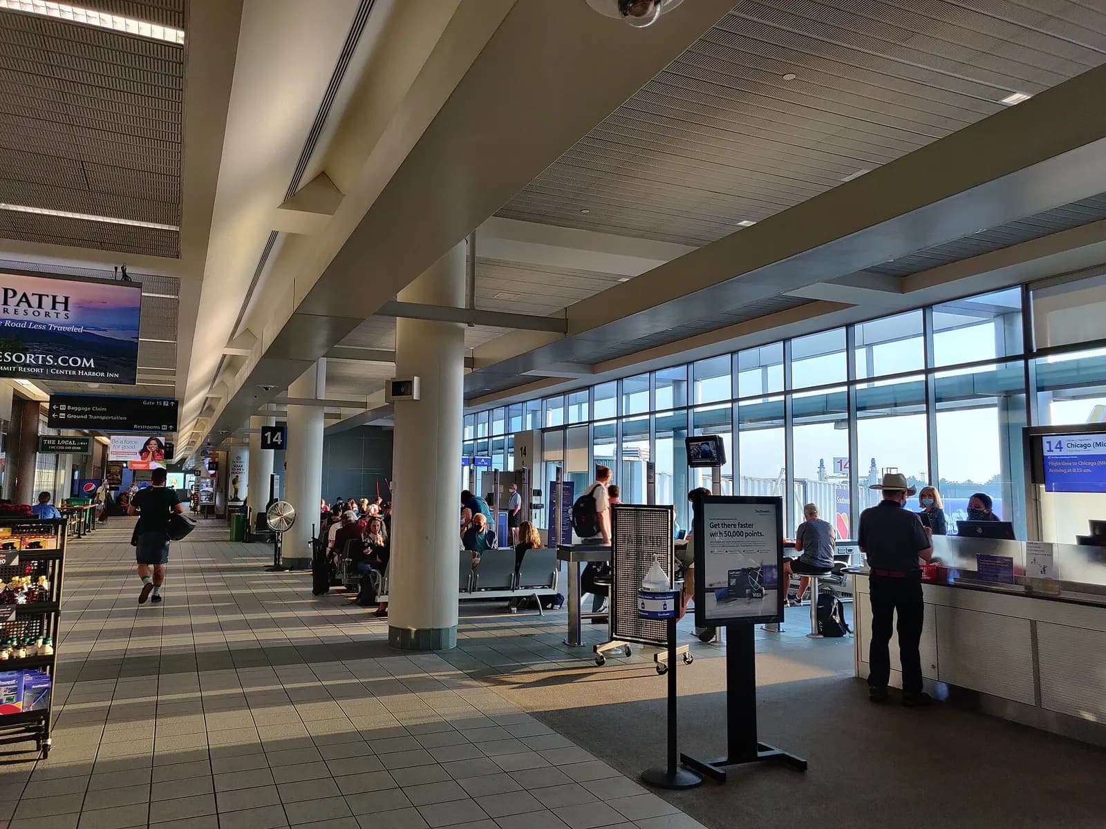 Airside holdroom and departure gates at Manchester-Boston Regional Airport in July 2021