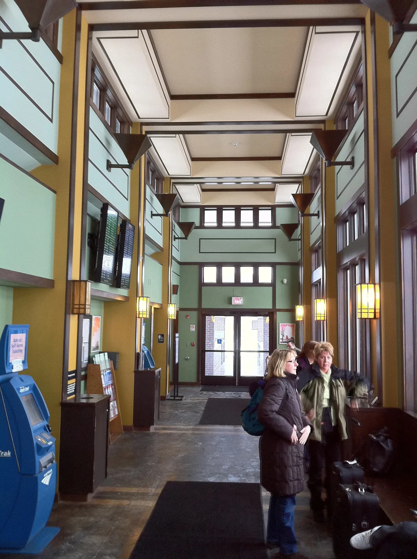 Milwaukee Airport Rail Station waiting room with an Amtrak Quik-Trak kiosk.