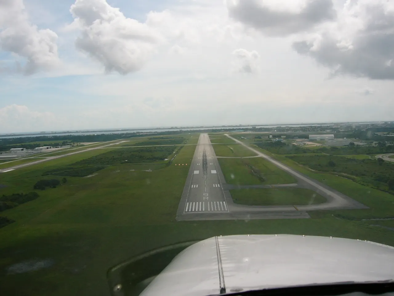 Approach view of runway 9R at Melbourne Orlando International Airport.