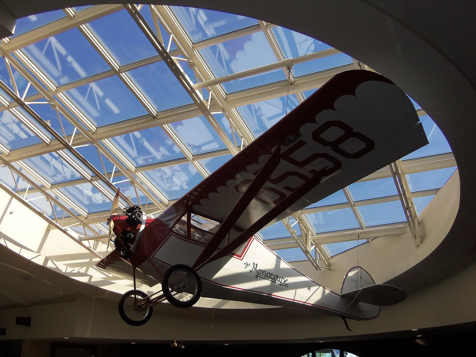 Velie-powered Monocoupe 70 hanging in the Quad Cities International Airport passenger hall