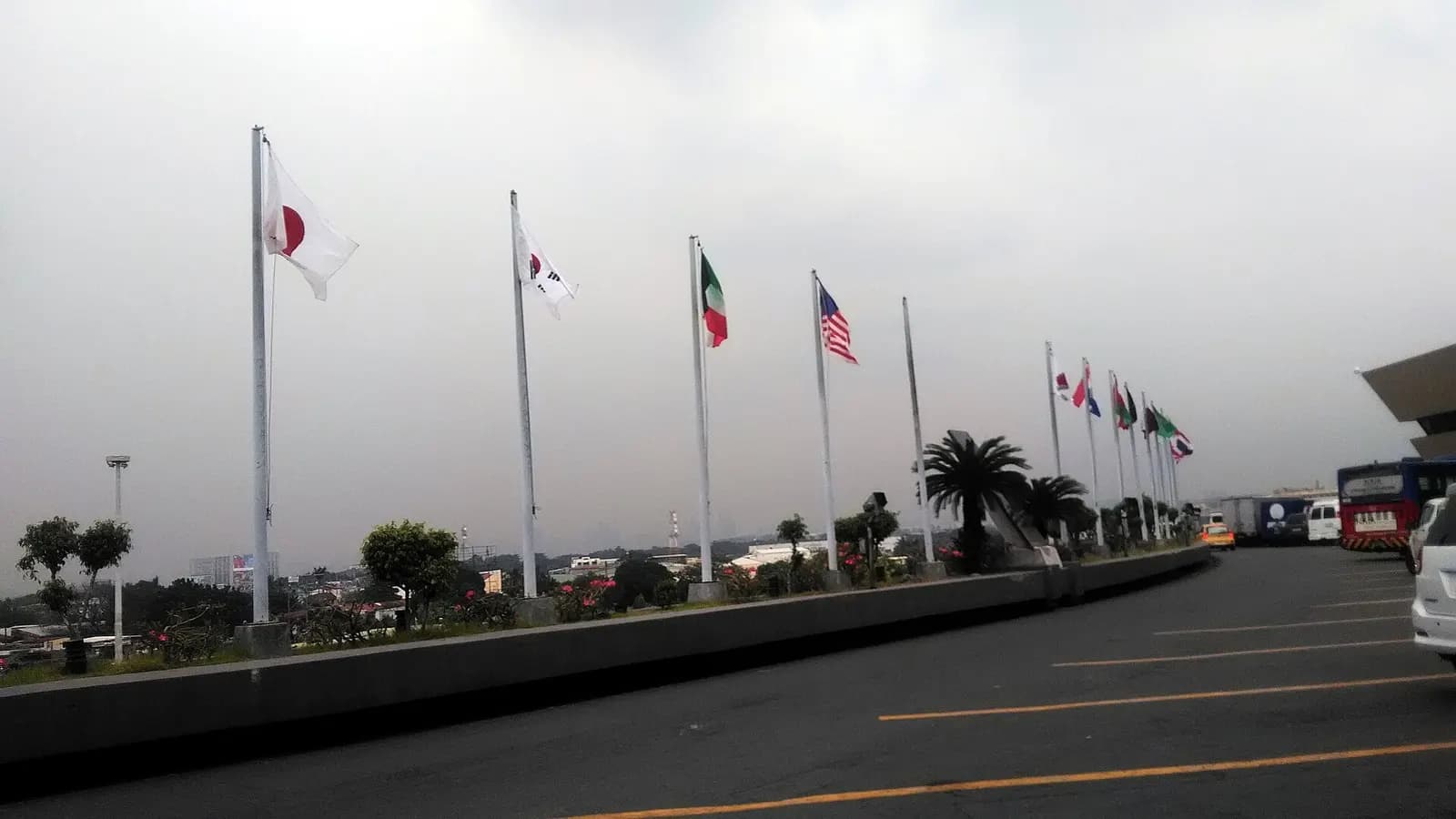 Flags of different countries at the ramp of NAIA Terminal 1