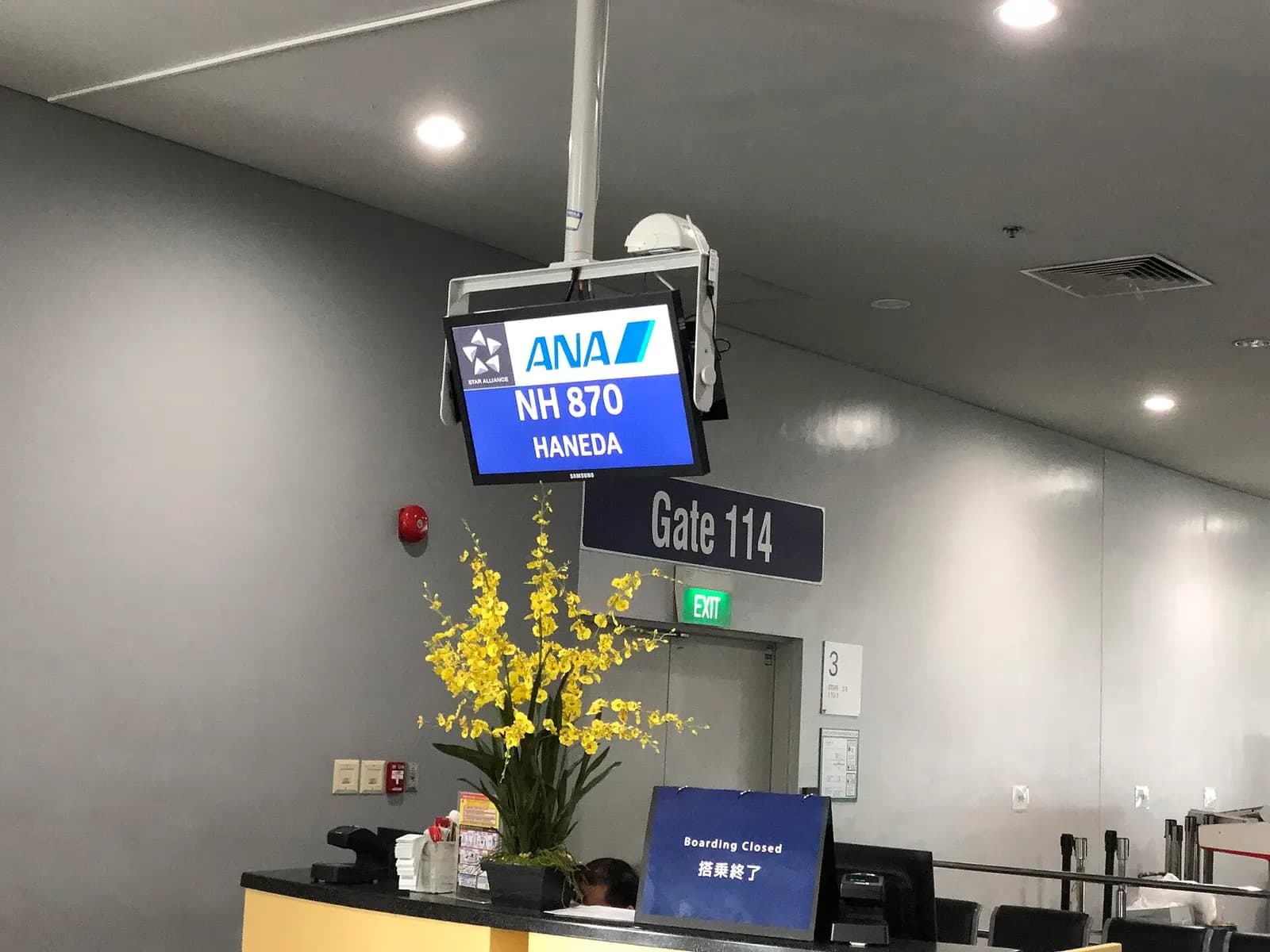 An ANA departure screen in English inside NAIA Terminal 3.
