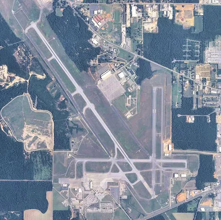 USGS digital orthophoto of Mobile Regional Airport looking down on the runways, terminal apron, and west-Mobile campus.
