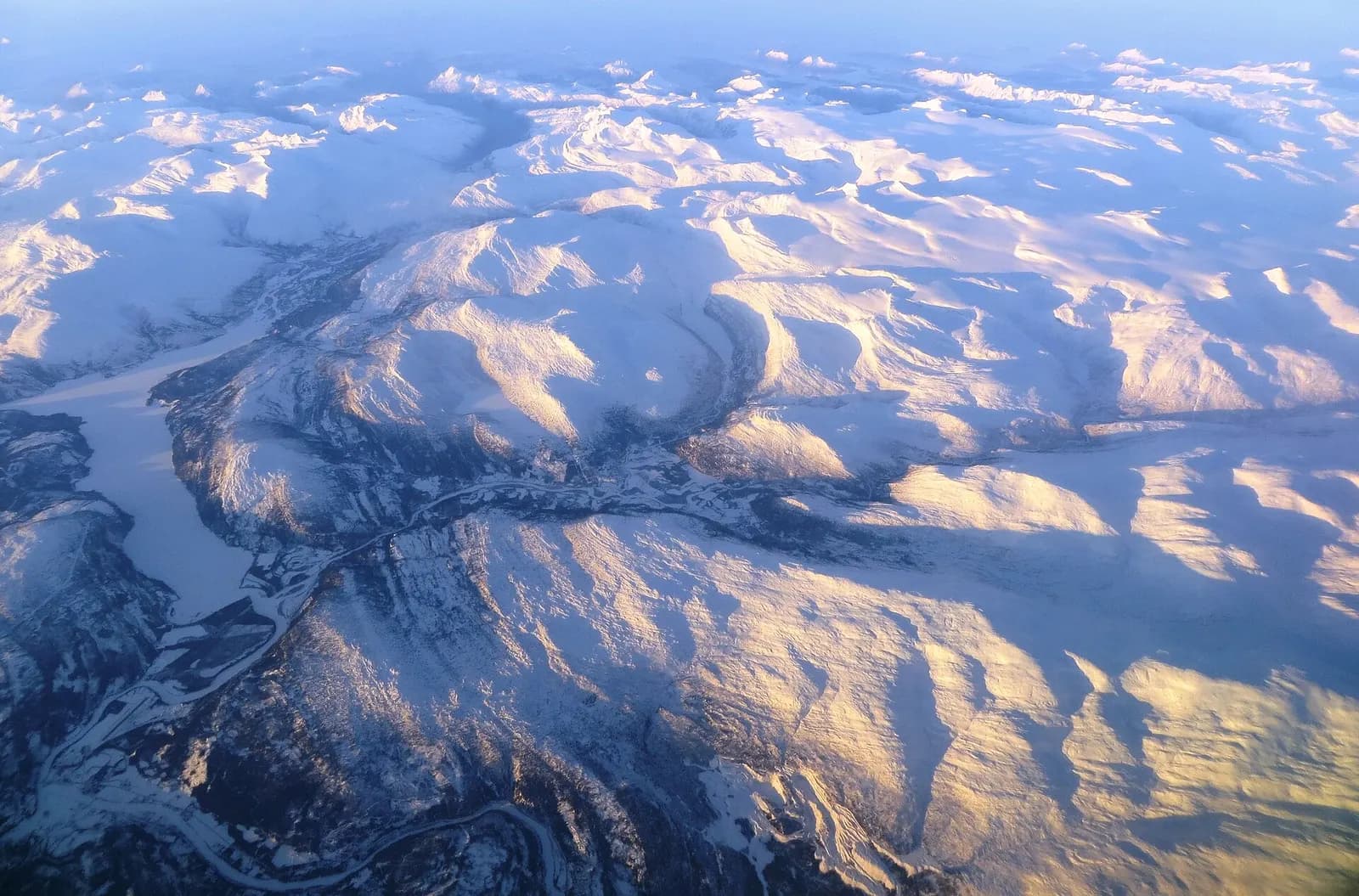 Aerial view from the (north)east towards the (south)west, over Rana municipality, with Mo I Rana city at the bottom of the Ranafjorden, Nordland County (Norway).