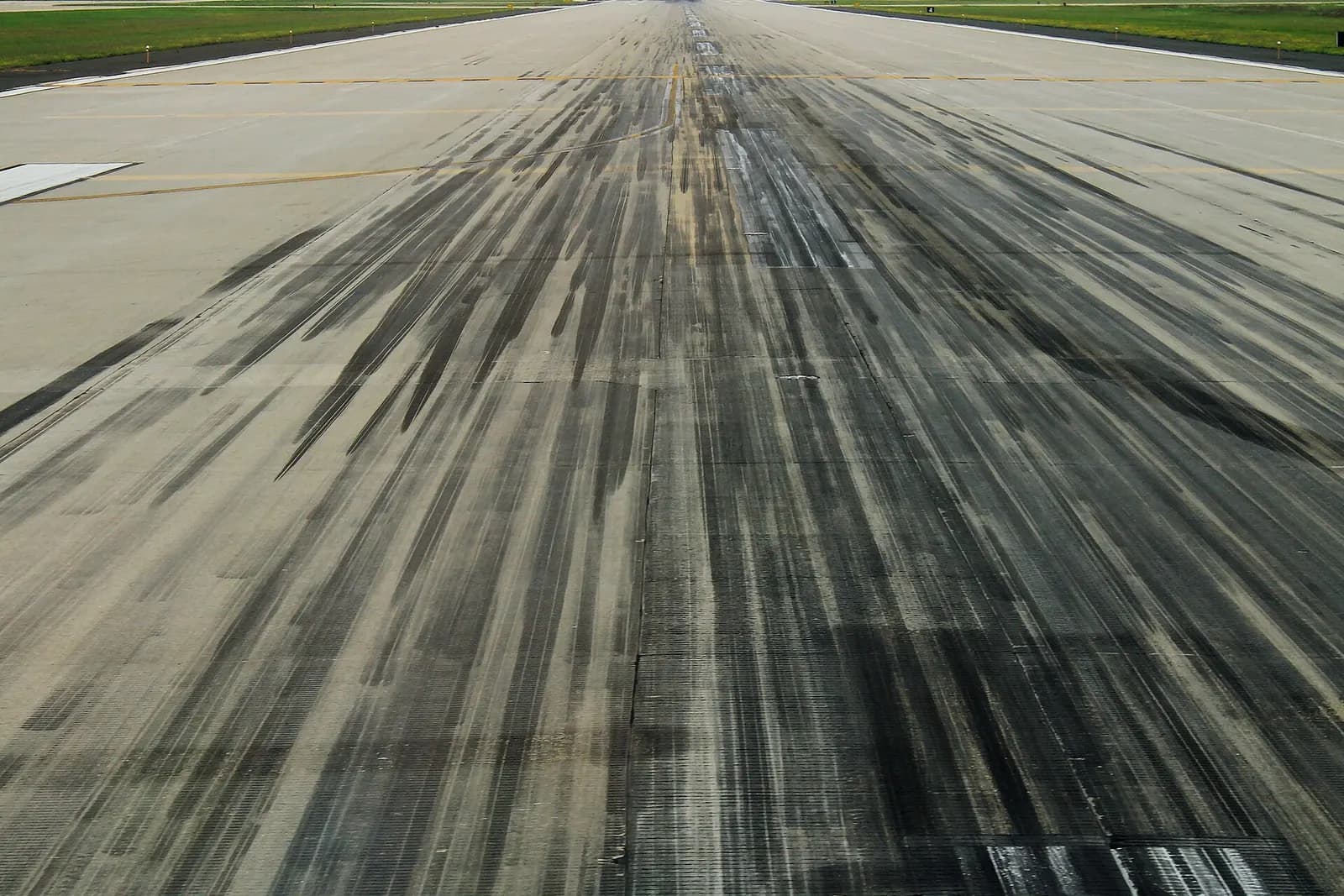 Looking down a concrete runway at Dane County Regional Airport–Truax Field in July 2016.