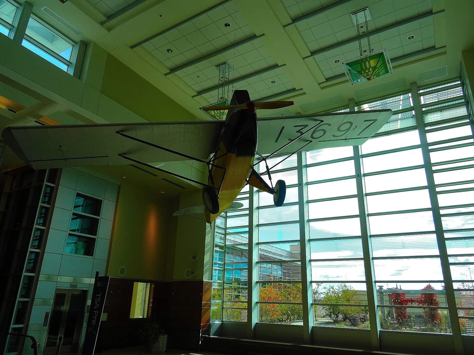 Full-size 1930s Corben Super Ace replica hanging in the Dane County Regional Airport landside lobby, October 2015.