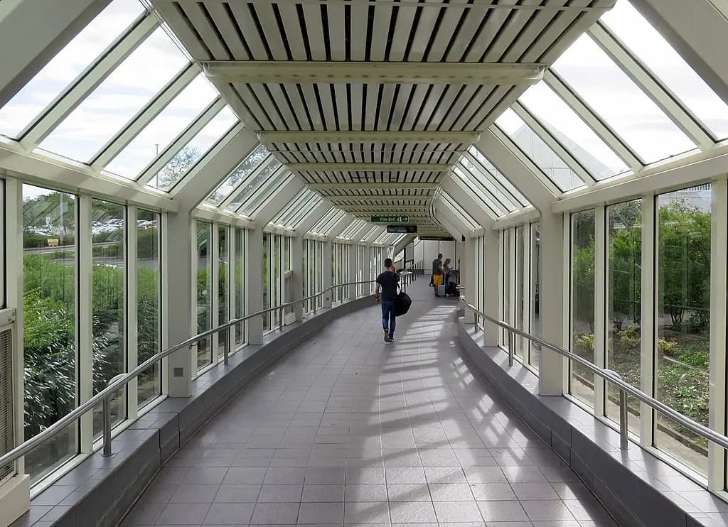 Covered walkway from Newcastle Airport terminal to the Metro station